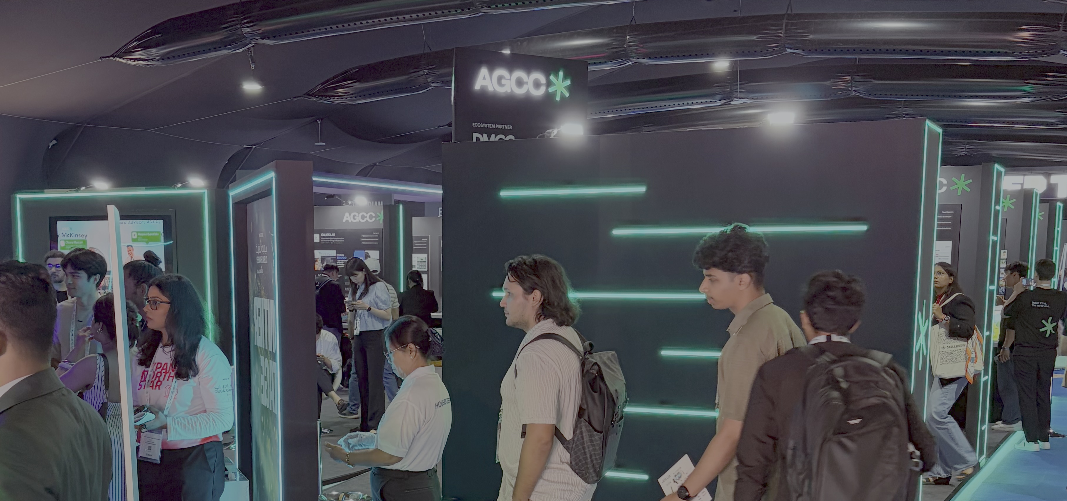 Cofounder of UniAI discussing AI-based poultry farming solutions in an interview at the AGCC booth during Expand North Star 2024.