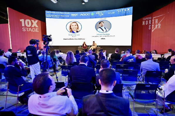 AGCC session on the 10x Stage at Expand North Star 2024, featuring a discussion on AI practices with Chiara Marcati of QuantumBlack, AI by McKinsey, and Alessio Garofalo of NEOM.