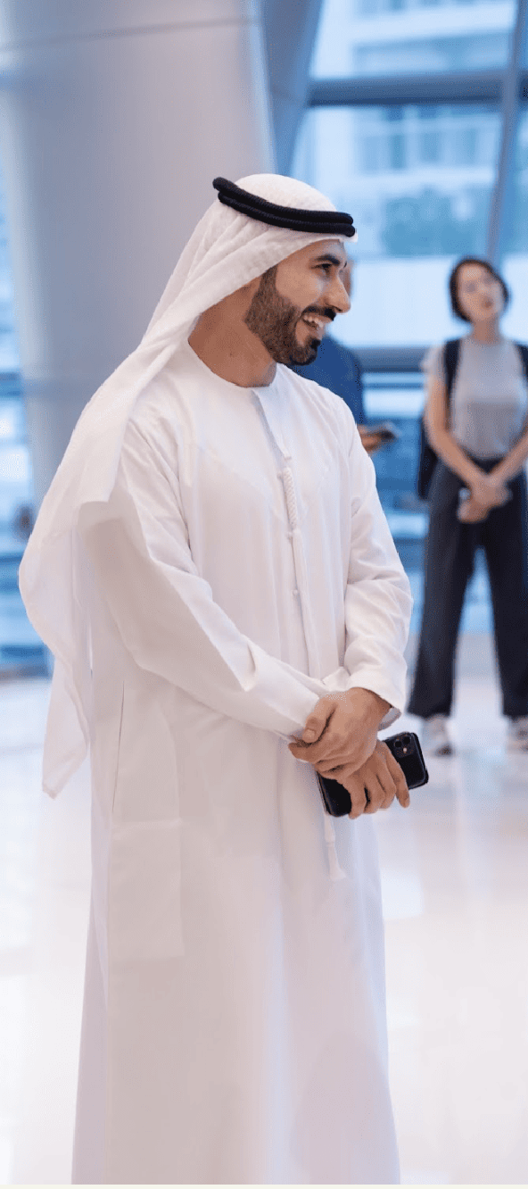 Emirati participant attending AGCC Business Forum 2024, engaging in discussions on Korea-UAE partnerships.