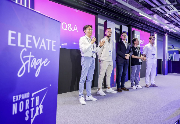 Startup finalists participating in a Q&A session on the Elevate Stage during the DMCC x AGCC Global AI Competition Sustainability Edition at Expand North Star 2024.